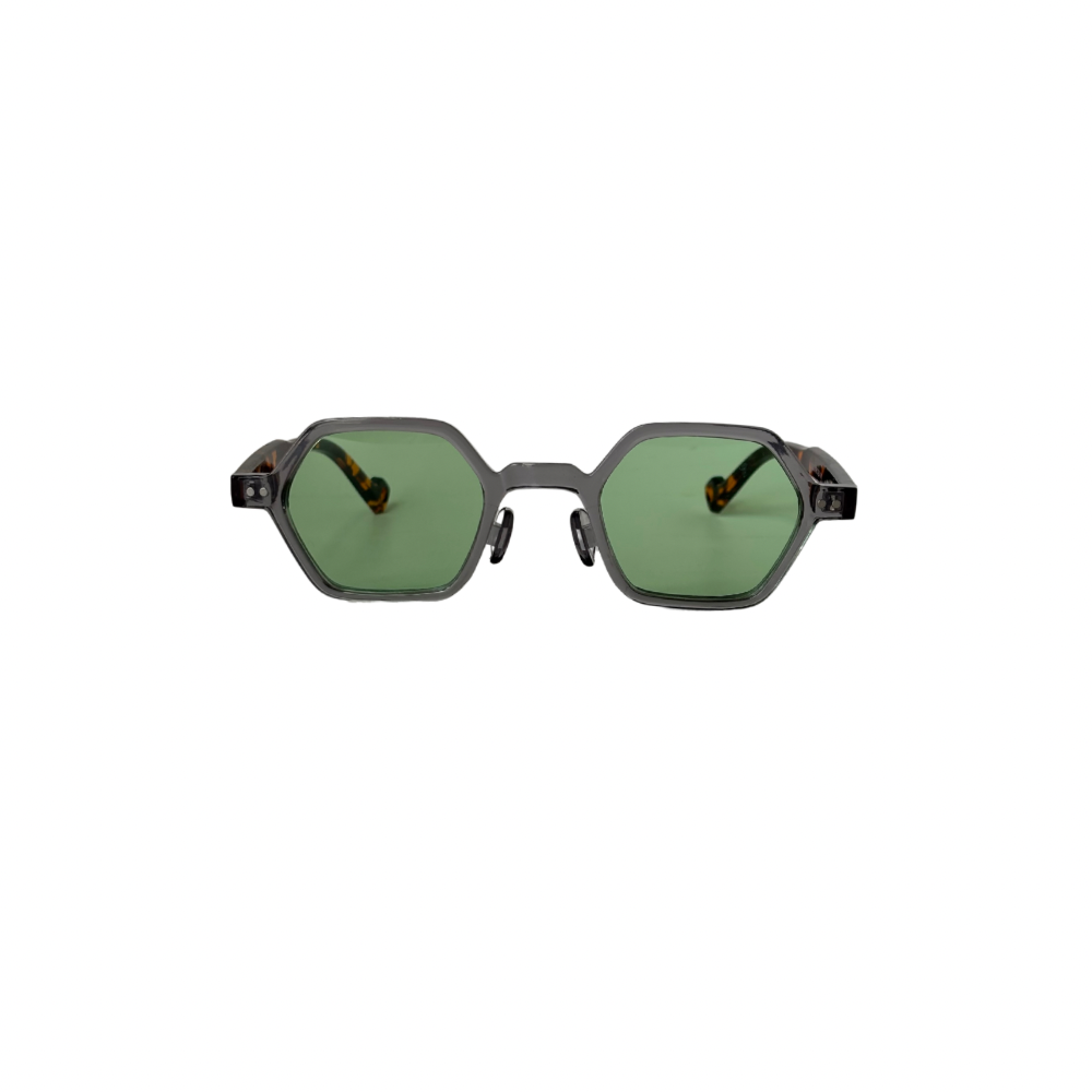 Sunglasses with green lenses and black frames on a white background