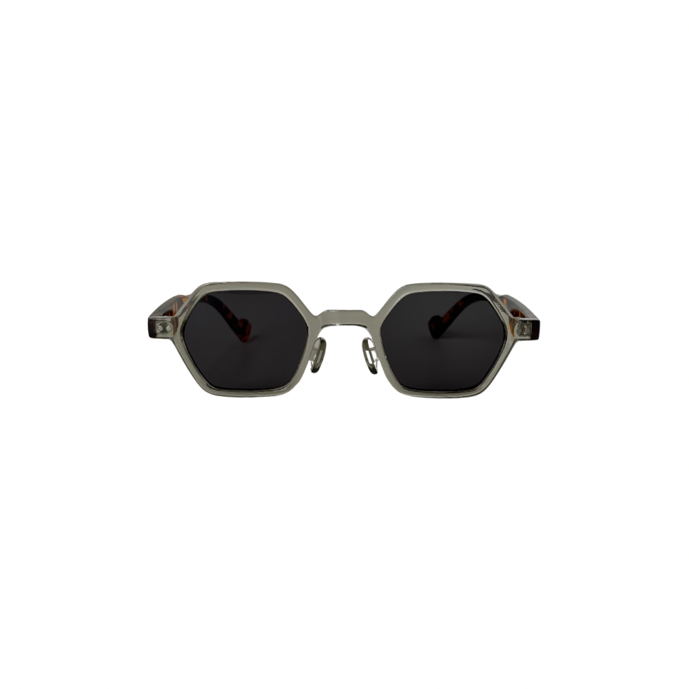 Hexagonal sunglasses with dark lenses on a white background